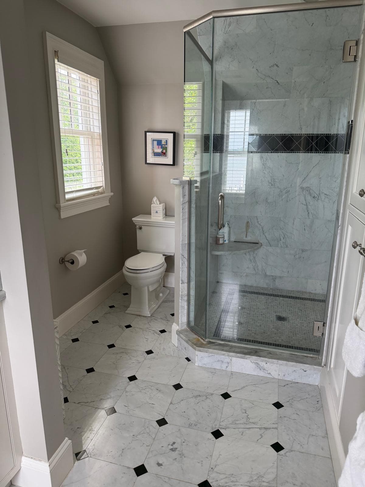 Disinfected and detailed bathroom with glass shower